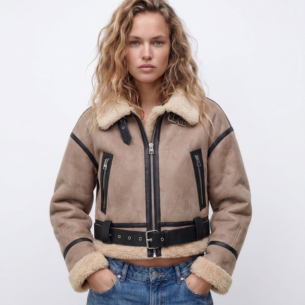 Women’s double-sided shearling bomber jacket by Christine Brewer, featuring plush shearling fabric and a stylish bomber design.