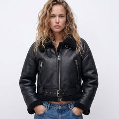 Women's double-sided shearling bomber jacket by Christine Brewer, showcasing cozy shearling material and stylish design.