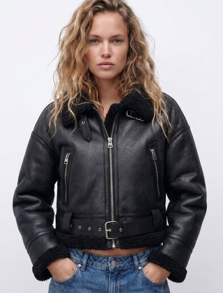 Women's double-sided shearling bomber jacket by Christine Brewer, showcasing cozy shearling material and stylish design.