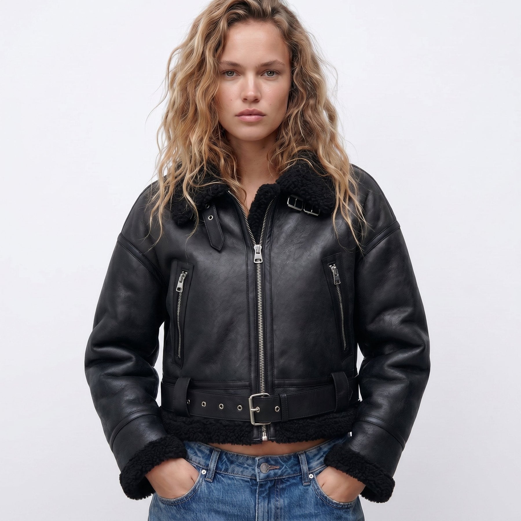 Women's double-sided shearling bomber jacket by Christine Brewer, showcasing cozy shearling material and stylish design.