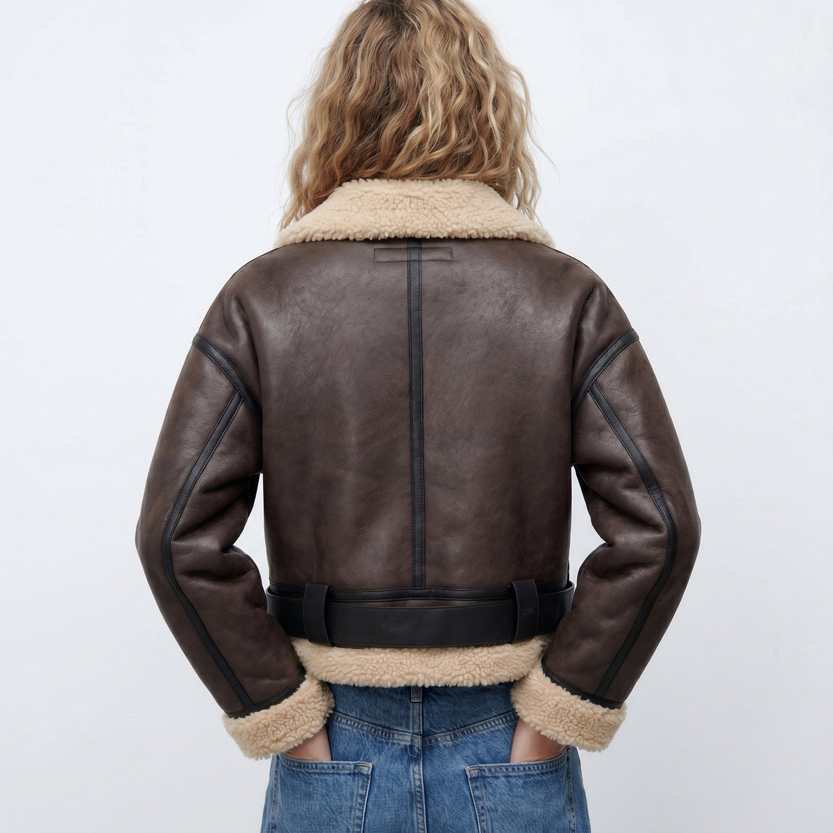 Isabella women's double-sided shearling bomber jacket by Christine Brewer, showing the cozy shearling interior and stylish outer design.