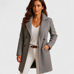 Elegant women's long tailored coat with button front and notch lapel by Christine Brewer, featuring a sophisticated design.