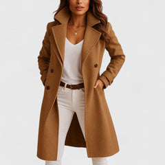 Elegant women's long coat by Christine Brewer featuring a notch lapel, slim fit, and button-up design.