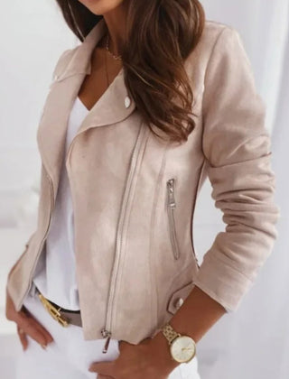 Women’s faux leather moto jacket with convertible collar and zip-up front, by Christine Brewer, shown on a model.