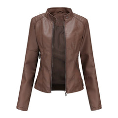 Women's faux leather moto jacket by Christine Brewer featuring a stand collar and zip-up front.