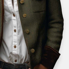 Women’s Victoria herringbone tweed military-style jacket with gold buttons by Christine Brewer, shown on a model.