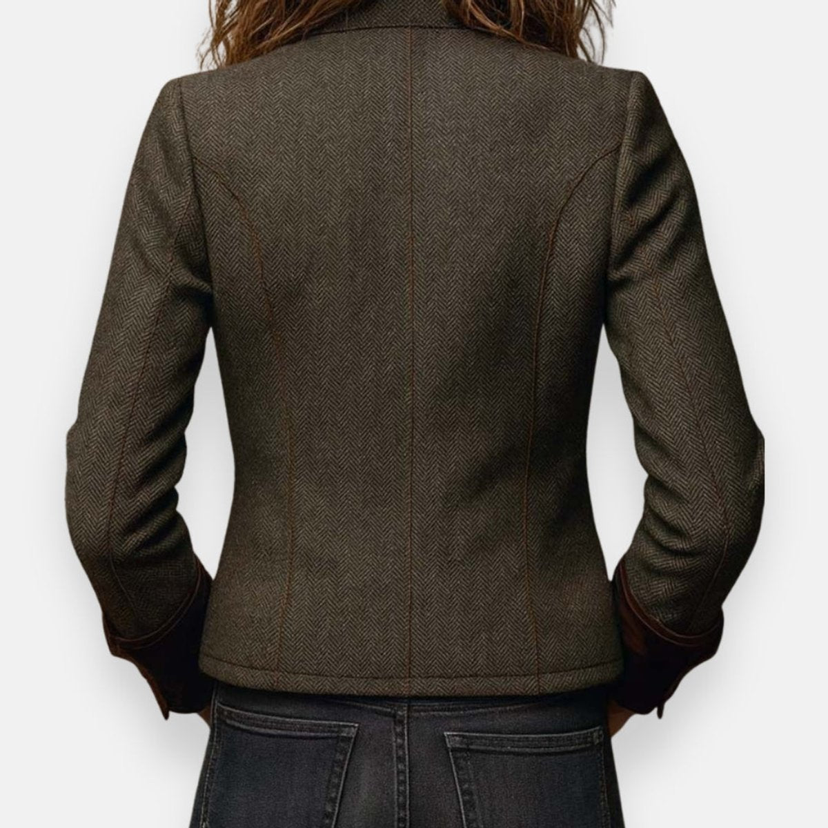 Victoria women's herringbone tweed military-style jacket with gold buttons by Christine Brewer, shown in a front view.