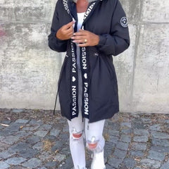 Women’s hooded drawstring midi parka coat by Christine Brewer, casual style with a relaxed fit and front pockets.