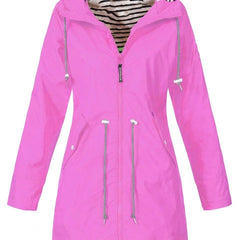 Victoria women's waterproof rain coat with hood and drawstring waist, designed by Christine Brewer, suitable for rainy weather.