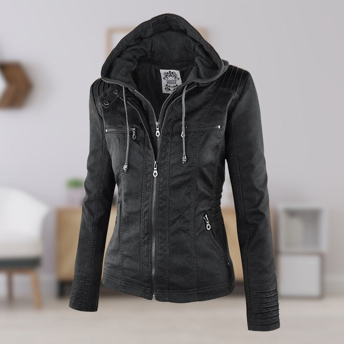 Women’s faux leather moto coat with removable hood, Charlotte by Christine Brewer, featuring a stylish hooded design and sleek black finish.