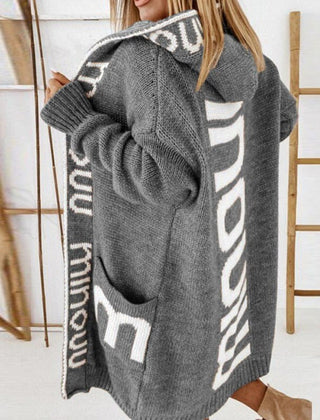 Women’s Eleanor knit cardigan sweater jacket with hood and open front featuring a stylish letter print, by Christine Brewer.