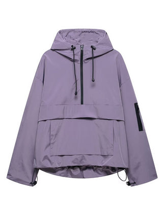 Women's quilted hooded pullover anorak jacket with half-zip by Christine Brewer, featuring a cozy hood and stylish design.