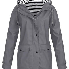 Women's Eleanor waterproof rain coat by Christine Brewer with hood, striped lining, and zip-up front for rainy weather protection.