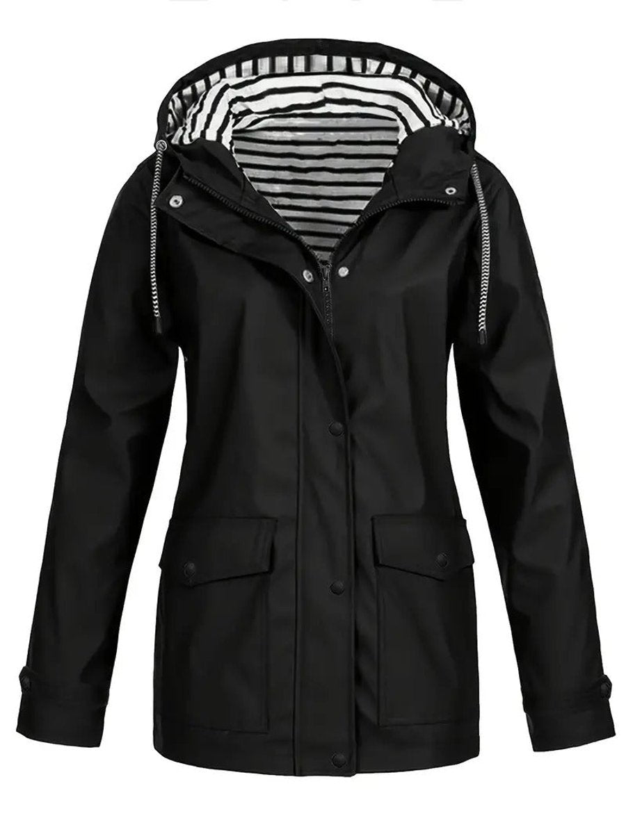 Women's waterproof rain coat with hood, striped lining, and zip-up front by Christine Brewer, designed for rainy weather.