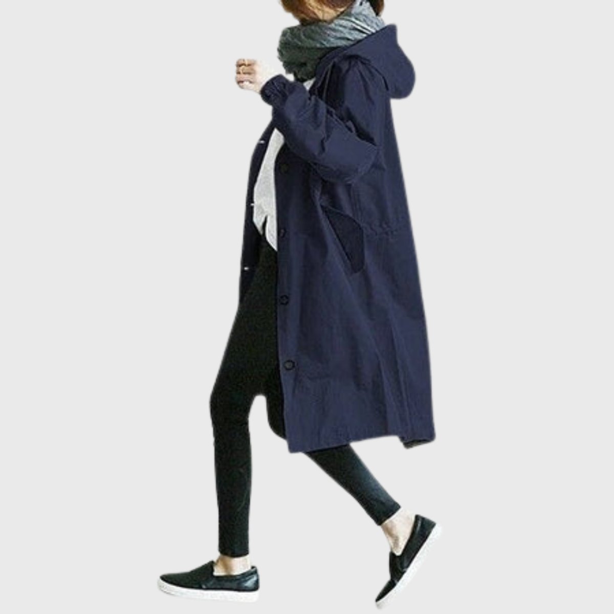 Women’s oversized hooded water-repellent trench coat by Christine Brewer, showing the long, stylish design with hood and water-resistant fabric.