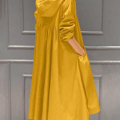 Women's waterproof long trench coat with hood and zip-up front by Christine Brewer, designed for rain protection and style.