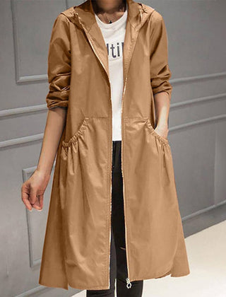 Women's waterproof long trench coat with hood and zip-up front by Christine Brewer, ideal for rainy weather.