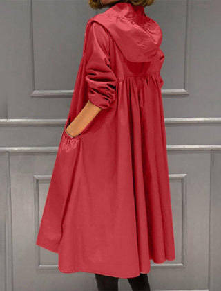 Scarlett women's hooded waterproof longline trench coat by Christine Brewer, shown in a stylish, rain-ready design.