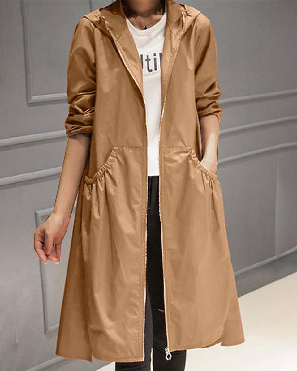 Scarlett women's hooded waterproof longline trench coat by Christine Brewer, shown in black, with a hood and sleek rainproof design.