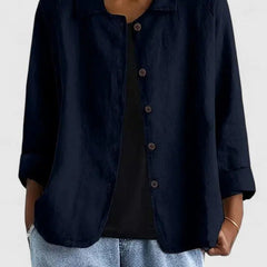 Women’s lightweight cotton button-up jacket by Christine Brewer, shown in a stylish, casual fit with long sleeves and front buttons.