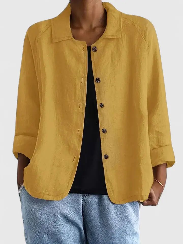 Women's lightweight cotton button-up jacket by Christine Brewer, featuring a classic collar and front button closure.