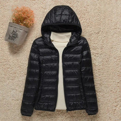 Women's Sienna lightweight hooded quilted jacket by Christine Brewer, packable down puffer with a cozy hood and quilted design.