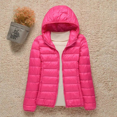 Women's Sienna lightweight hooded quilted jacket by Christine Brewer, packable down puffer with a cozy hood and quilted design.