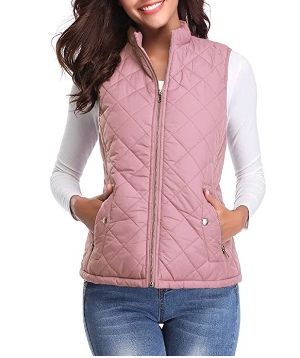 Women's lightweight quilted gilet by Christine Brewer, sleeveless zip-up jacket with a stylish quilted design and comfortable fit.