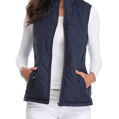 Women's lightweight quilted gilet by Christine Brewer, sleeveless zip-up jacket with padded design and stand collar.