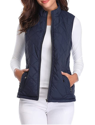 Women's lightweight quilted gilet by Christine Brewer, sleeveless zip-up jacket with padded design and stand collar.