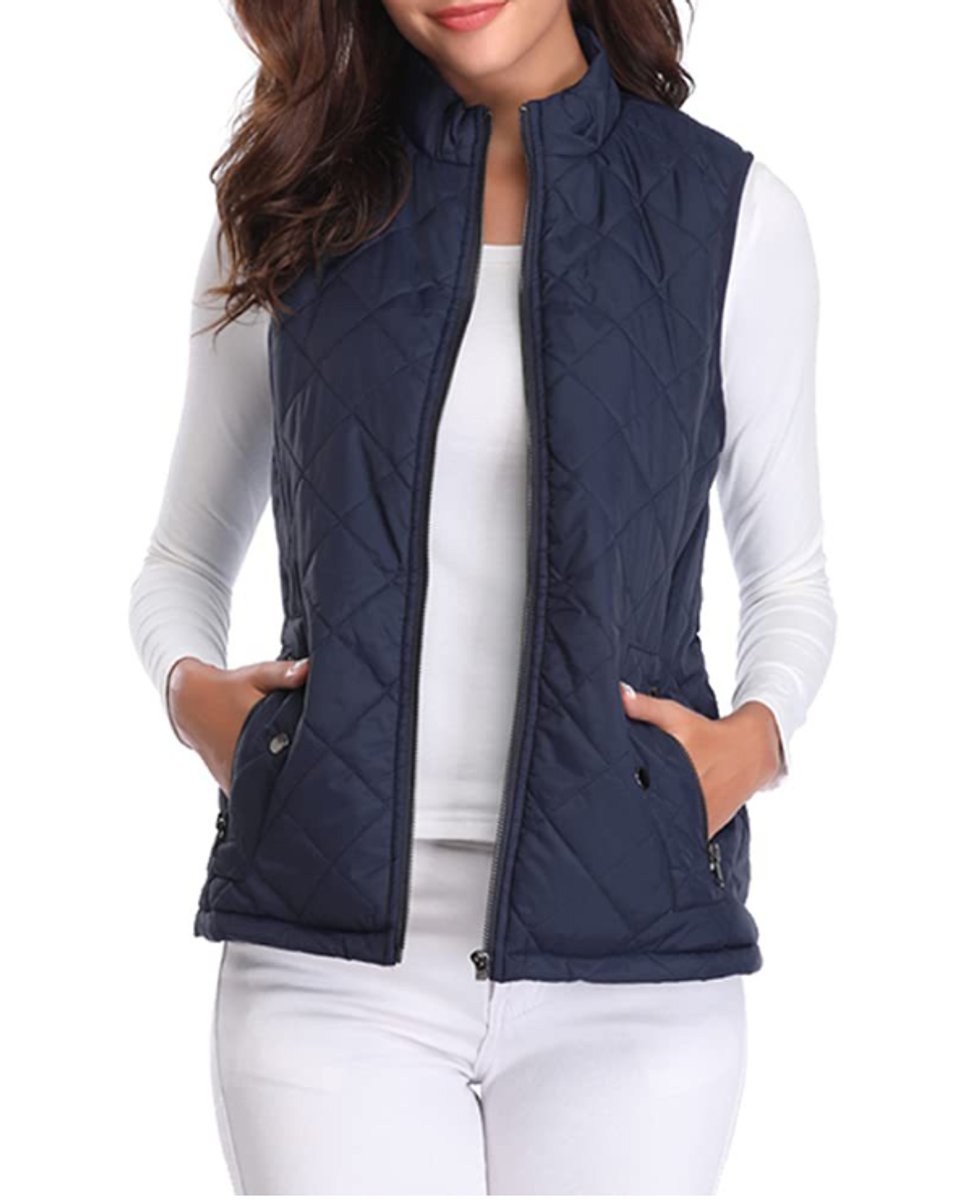 Women's lightweight quilted gilet by Christine Brewer, sleeveless zip-up jacket with padded design and stand collar.
