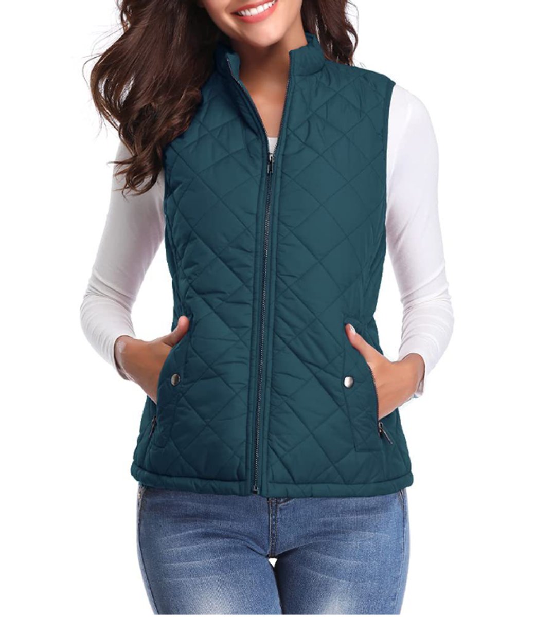 Women’s lightweight quilted sleeveless gilet by Christine Brewer with zip-up front, perfect for layering and casual wear.