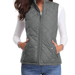 Women’s lightweight quilted sleeveless gilet by Christine Brewer, featuring a zip-up front and a fitted, stylish design.