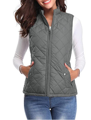 Women’s lightweight quilted sleeveless gilet by Christine Brewer, featuring a zip-up front and a fitted, stylish design.