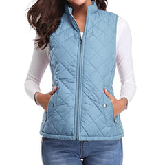 Women’s lightweight quilted sleeveless gilet by Christine Brewer, zip-up design, featuring a stylish, padded sleeveless jacket.