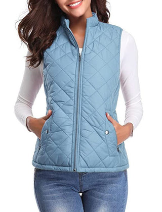 Women’s lightweight quilted sleeveless gilet by Christine Brewer, zip-up design, featuring a stylish, padded sleeveless jacket.