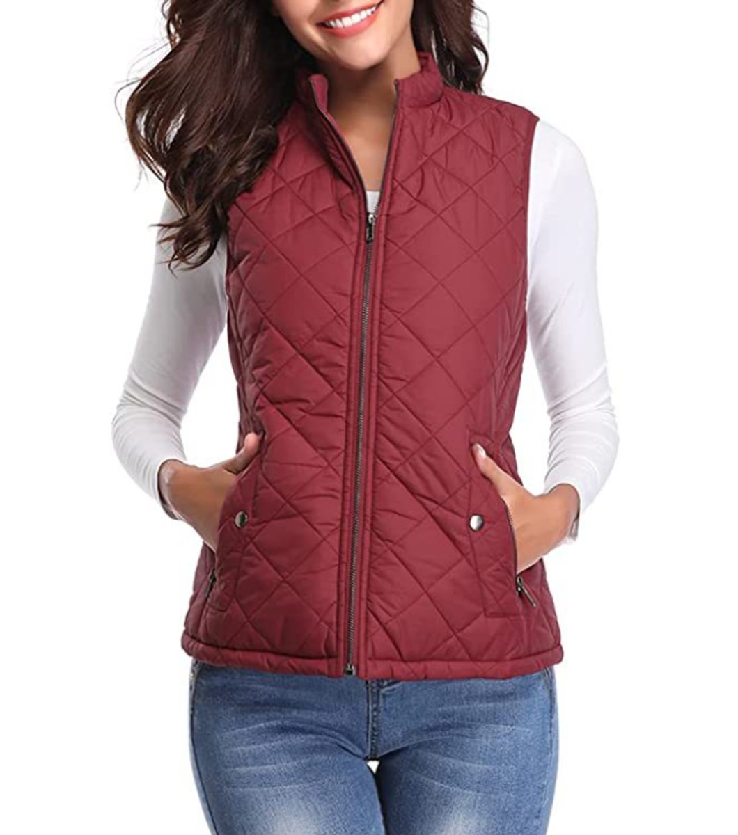 Women's lightweight quilted sleeveless gilet by Christine Brewer, zip-up design with a comfortable, stylish fit.