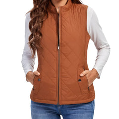 Women’s lightweight quilted sleeveless gilet by Christine Brewer featuring a zip-up front and stylish quilted design.