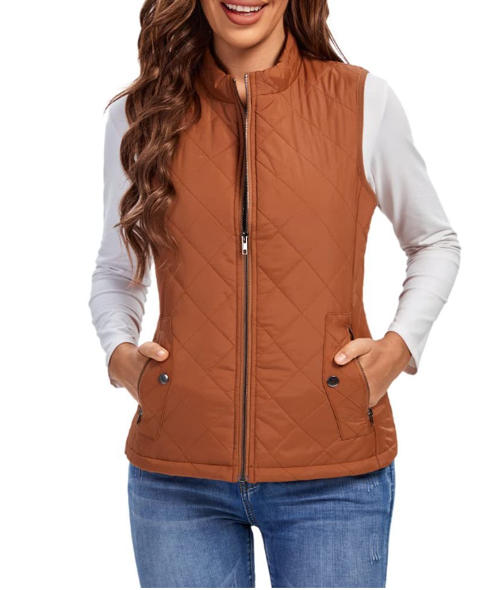 Women’s lightweight quilted sleeveless gilet by Christine Brewer featuring a zip-up front and stylish quilted design.