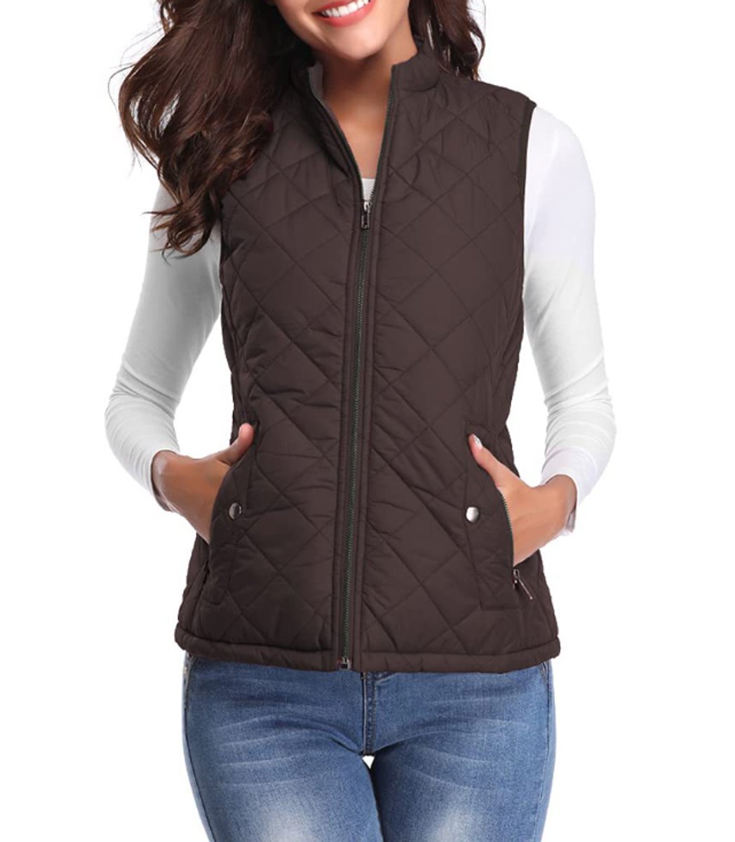 Women’s lightweight quilted sleeveless gilet by Christine Brewer, zip-up design, stylish and warm for layered outfits.