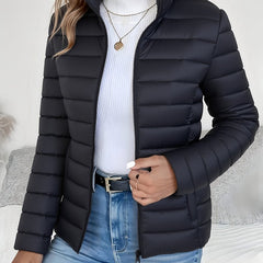 Christine Brewer Eleanor women's lightweight quilted puffer coat with stand collar and zip-up front, perfect for chilly weather.