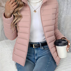 Women's lightweight quilted puffer coat with stand collar and zip-up front by Christine Brewer, perfect for chilly weather.
