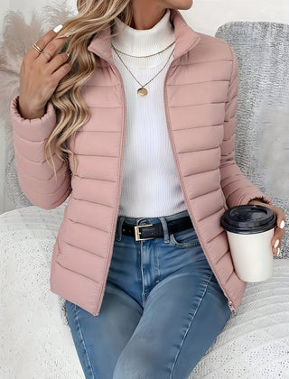 Women's lightweight quilted puffer coat with stand collar and zip-up front by Christine Brewer, perfect for chilly weather.