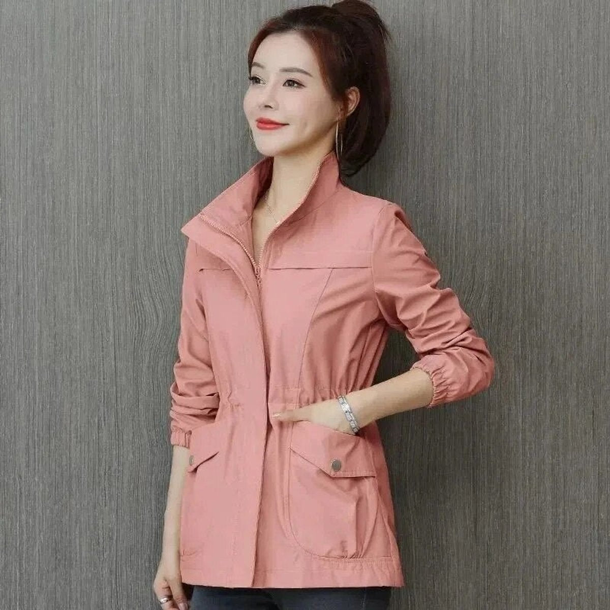 Women’s Sienna lightweight zip-up bomber jacket with drawstring waist, transitional style, by Christine Brewer.