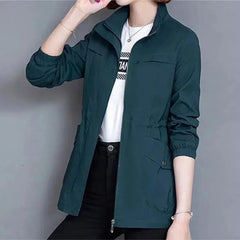 Lightweight women's zip-up bomber jacket with drawstring waist from Christine Brewer, featuring a transitional design and casual style.