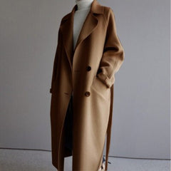 Women’s long double-breasted wool-blend trench coat by Christine Brewer, featuring a longline silhouette and classic design.