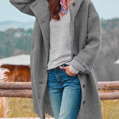 Victoria women's long hooded fleece coat with button-front closure, featuring a cozy hood and warm fleece fabric by Christine Brewer.