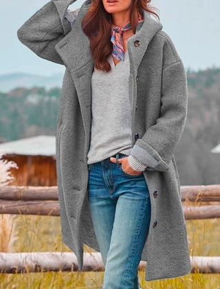 Victoria women's long hooded fleece coat with button-front closure, featuring a cozy hood and warm fleece fabric by Christine Brewer.