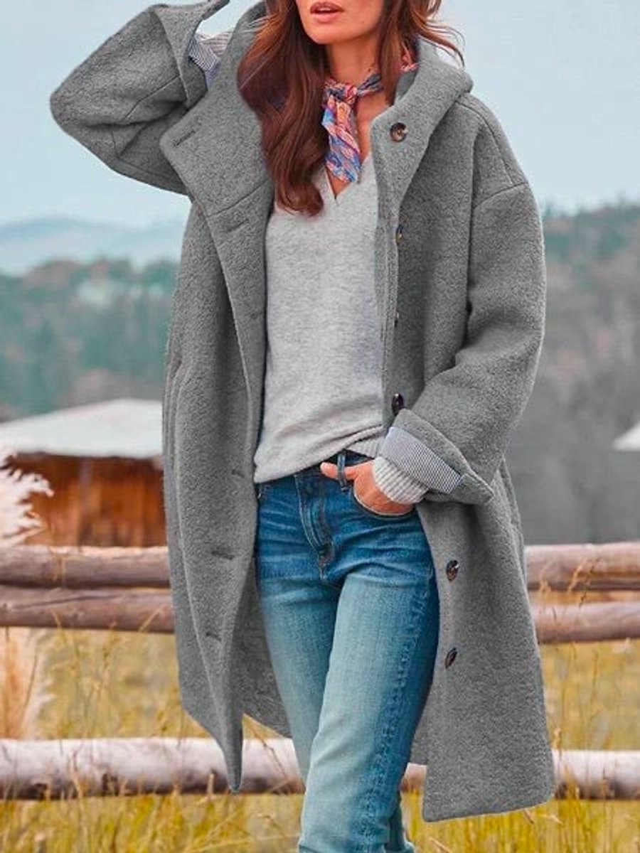 Victoria women's long hooded fleece coat with button-front closure, featuring a cozy hood and warm fleece fabric by Christine Brewer.