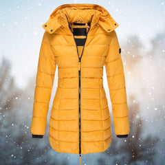 Emily women's long hooded quilted puffer coat by Christine Brewer, featuring a padded longline design and cozy hood.